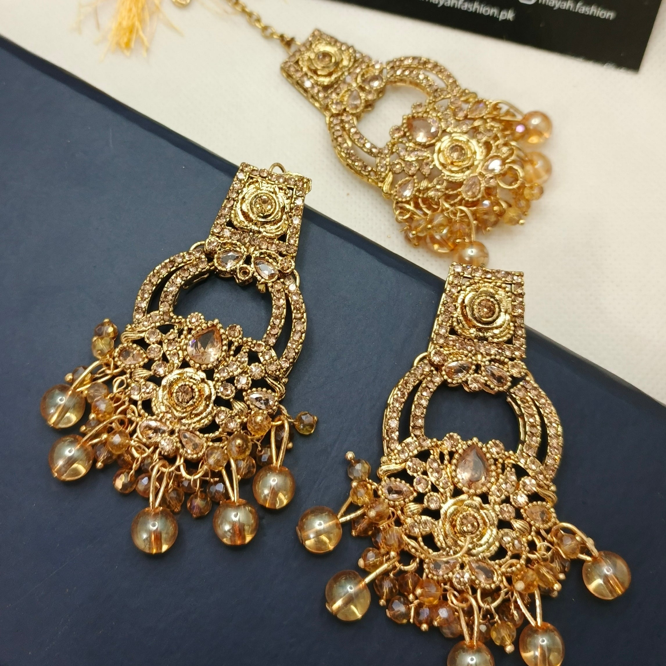 Earrings and Teeka
