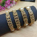 Set of 4 bangles(golden)
