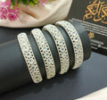 Sey of 4 zircon Bangles